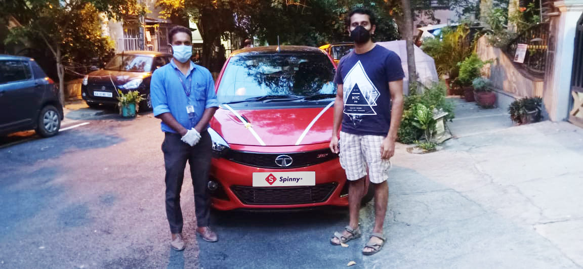 Tony George with his Spinny Assured Tata Tiago JTP