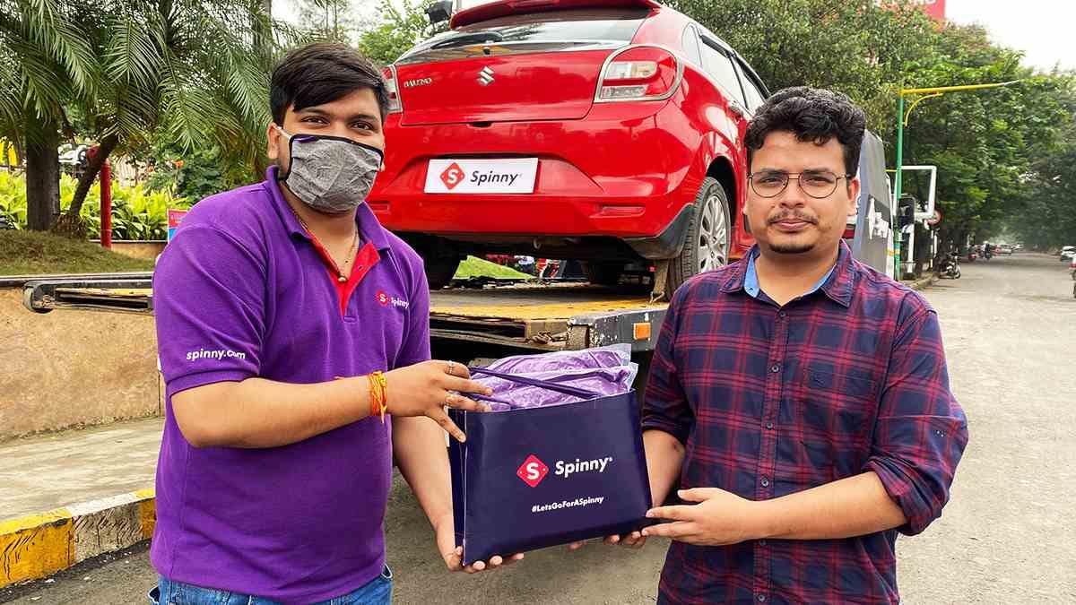 Spinny Customer Nilotpal Medhi taking delivery