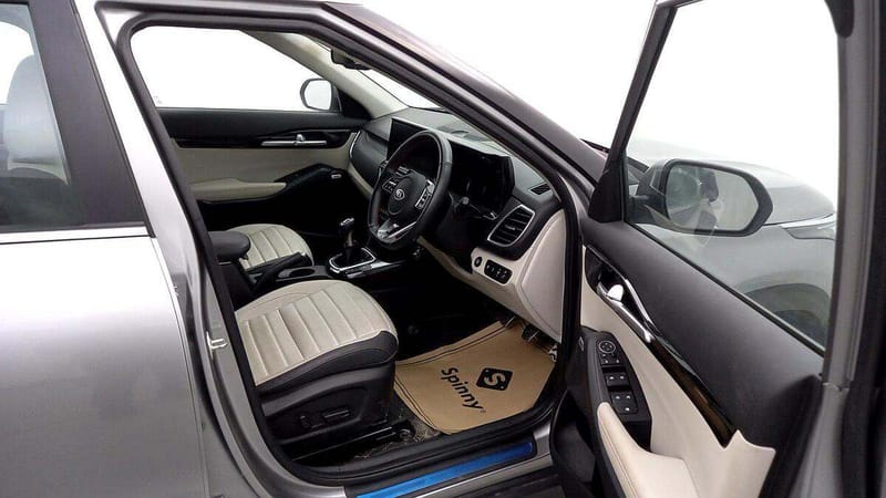 Spinny Assured Kia Seltos front seat