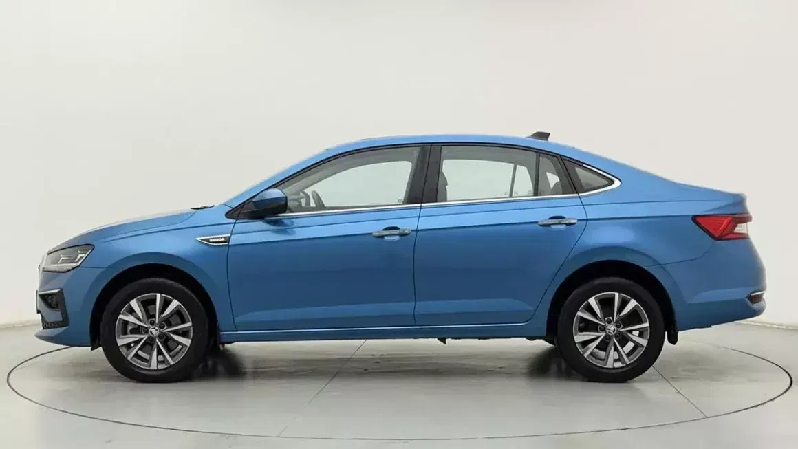 Spinny Assured Skoda Slavia blue