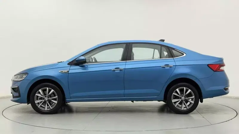 Spinny Assured Skoda Slavia blue